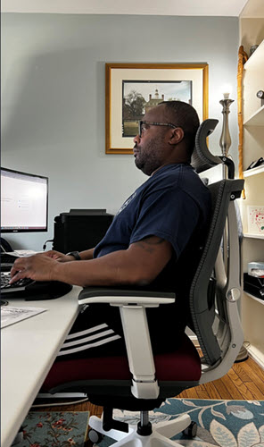 Seated at the Desk