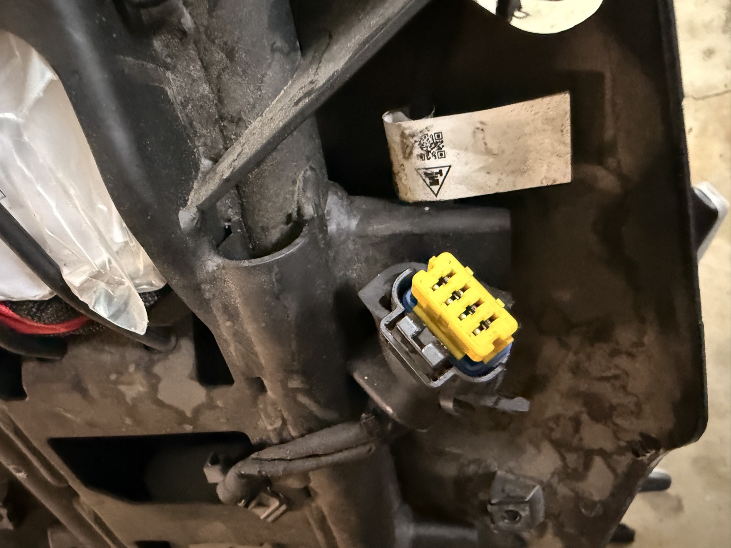 The under-seat connector on my Ducati Monster 821 that the local model identified from my photos and the owner's manual.